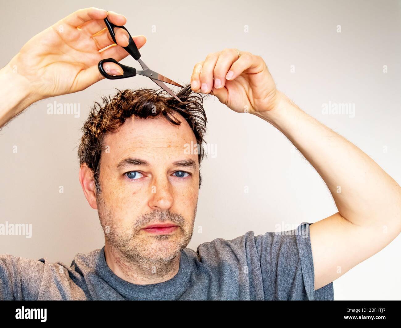 self hair cutting with scissors