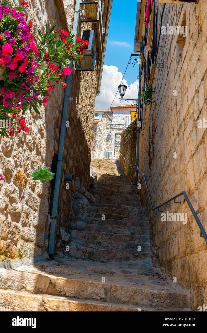 Narrow street in the old town of Perast, Montenegro Stock Photo