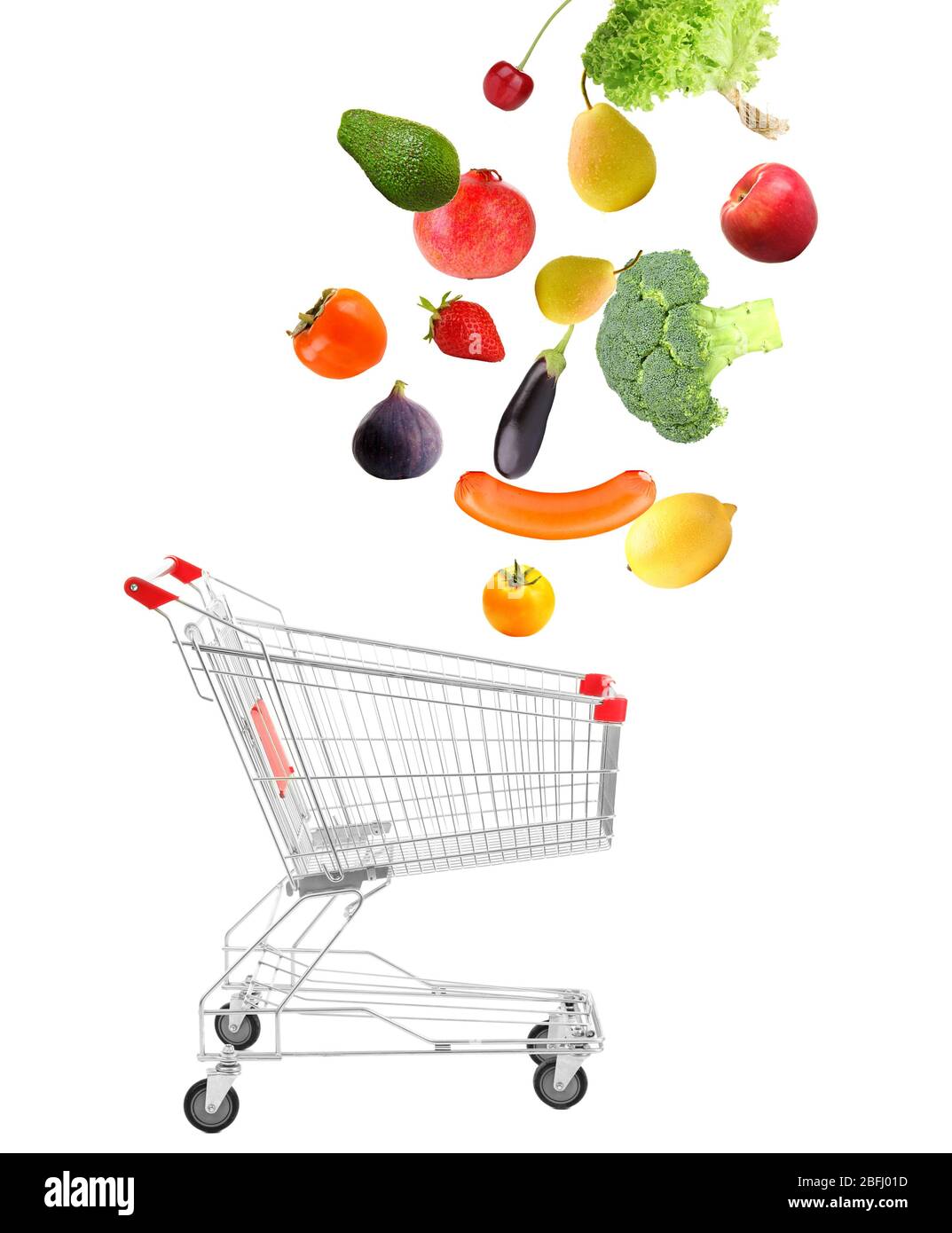 Products falling in shopping cart, isolated on white Stock Photo Alamy