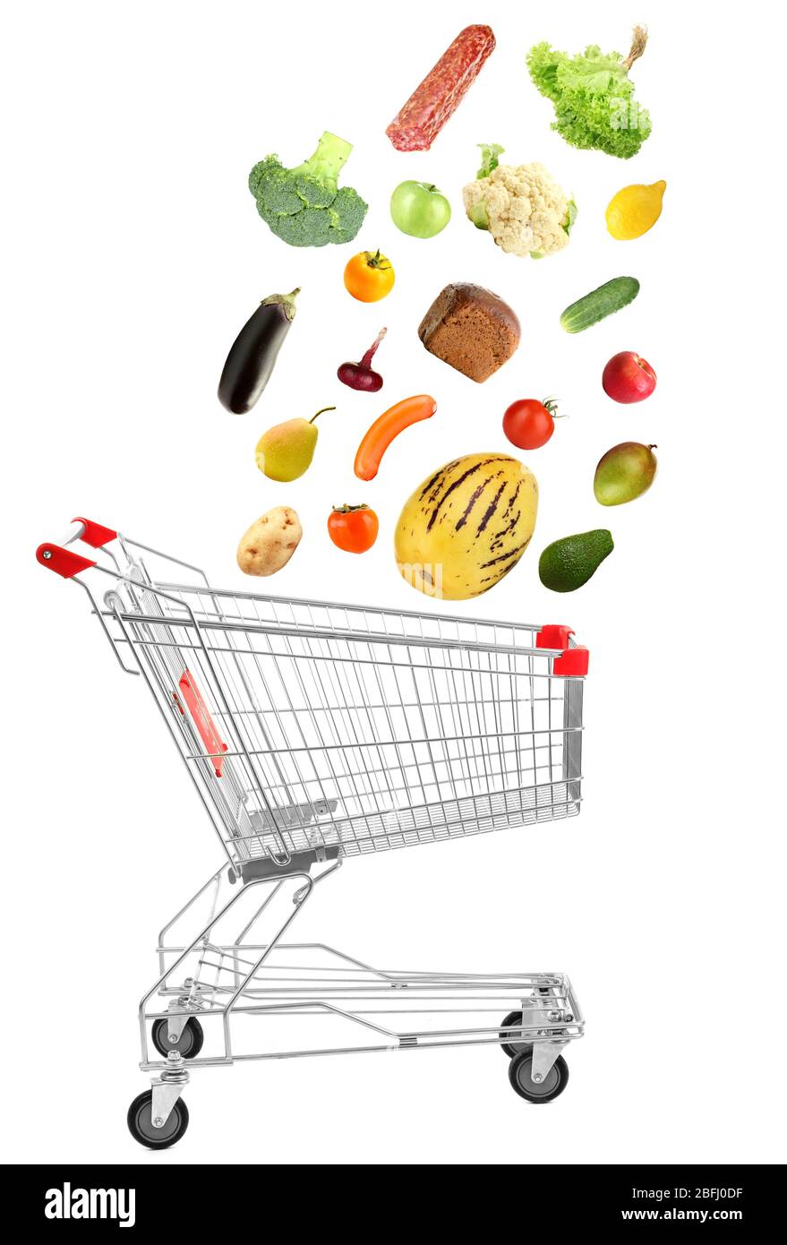 Products falling in shopping cart, isolated on white Stock Photo Alamy