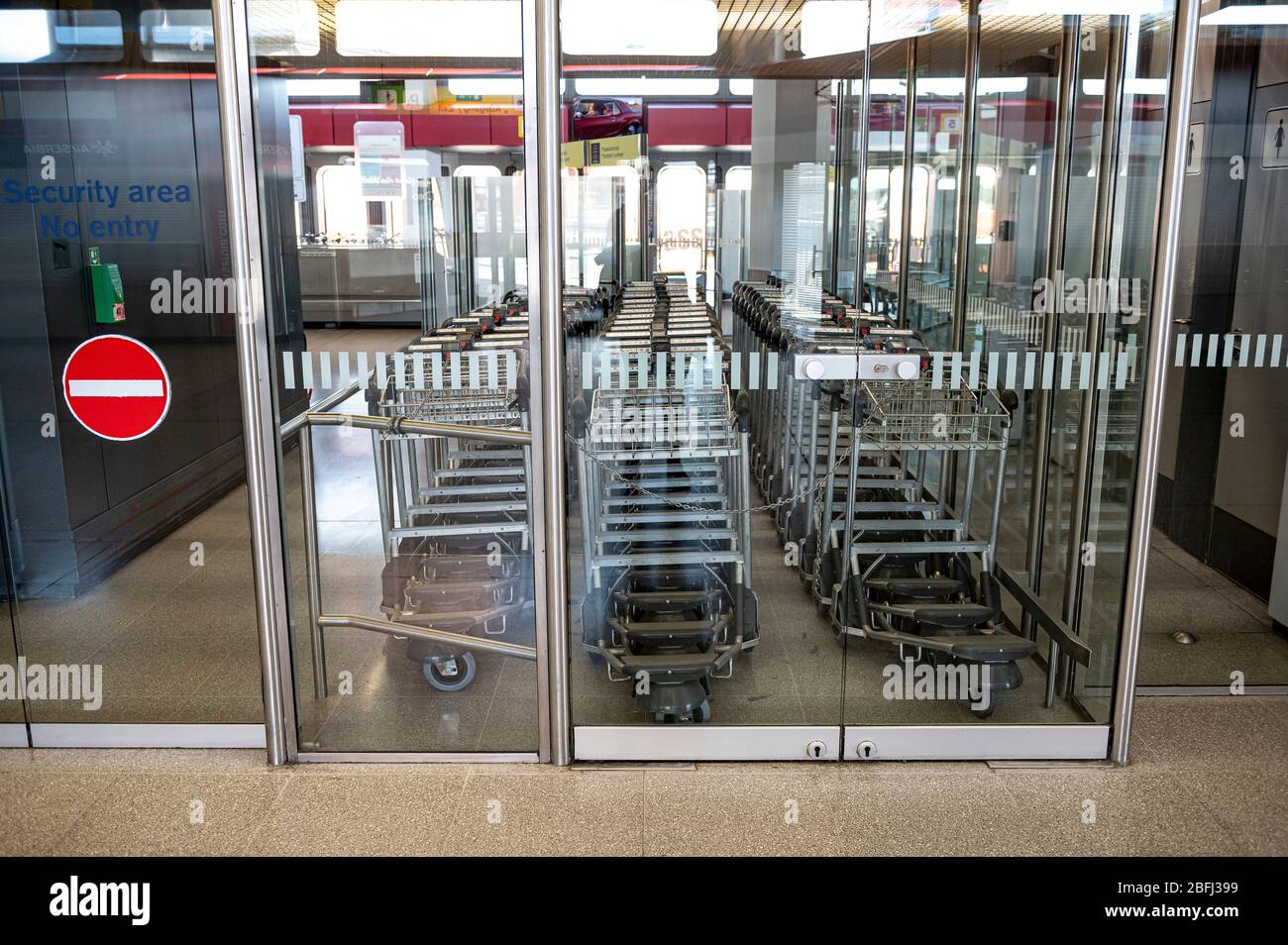 Berlin, Germany. 19th Apr, 2020. Baggage carts can be seen behind a