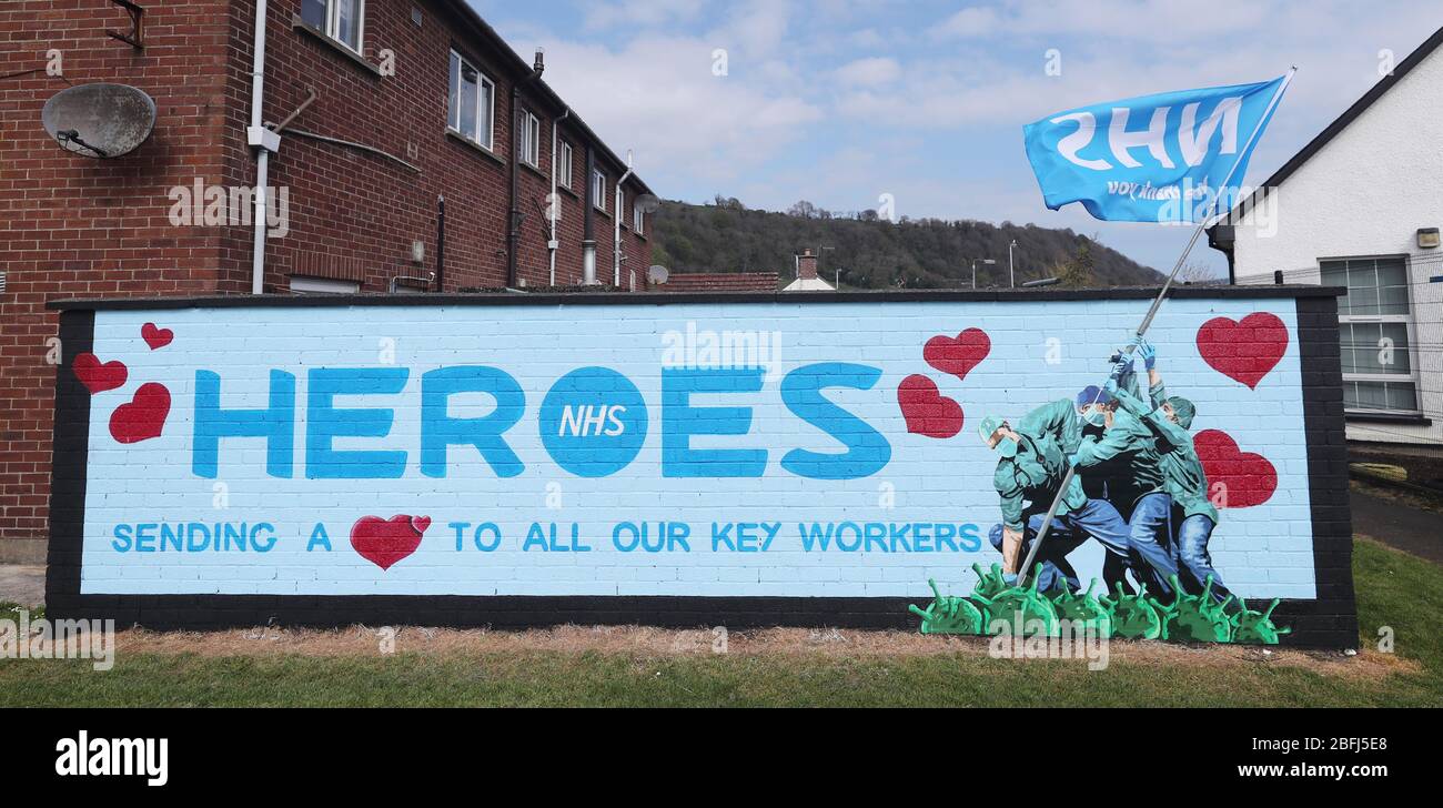 An Iwo Jima inspired NHS Heroes Mural by artists Ricky Morrow and Dee Craig in the village of Glynn Co Antrim as the UK continues in lockdown to help curb the spread of the coronavirus. Stock Photo