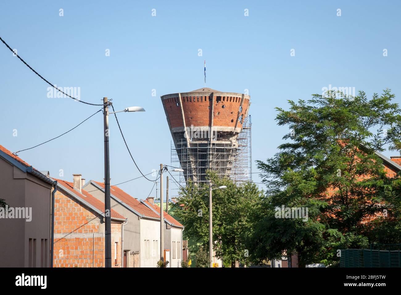 Water tower from Vukovar, with bullet and missile holes from the 1991-1995 conflict, which opposed Serbian to Croatian forces. The water tower became Stock Photo