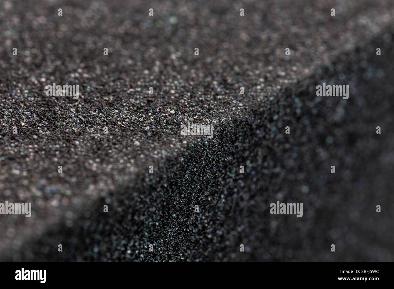 Close up black sponge texture Stock Photo - Alamy