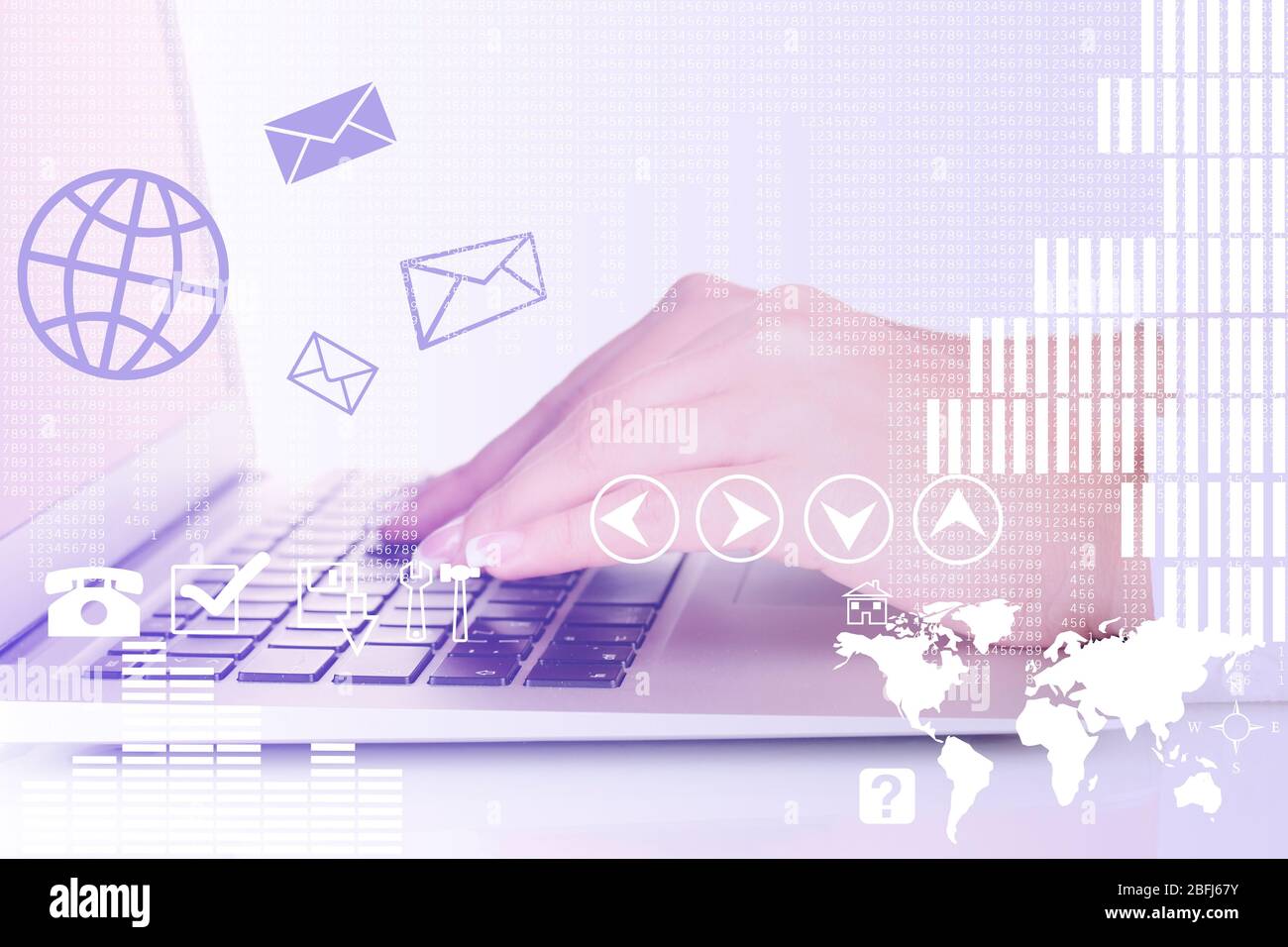 Businesswoman using laptop with digital layer effect on background Stock Photo