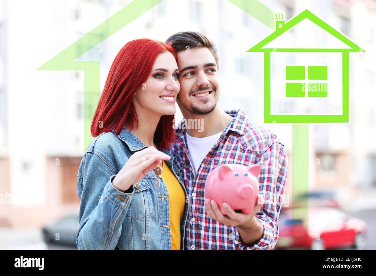Loving couple with piggy bank in drawing house Stock Photo - Alamy