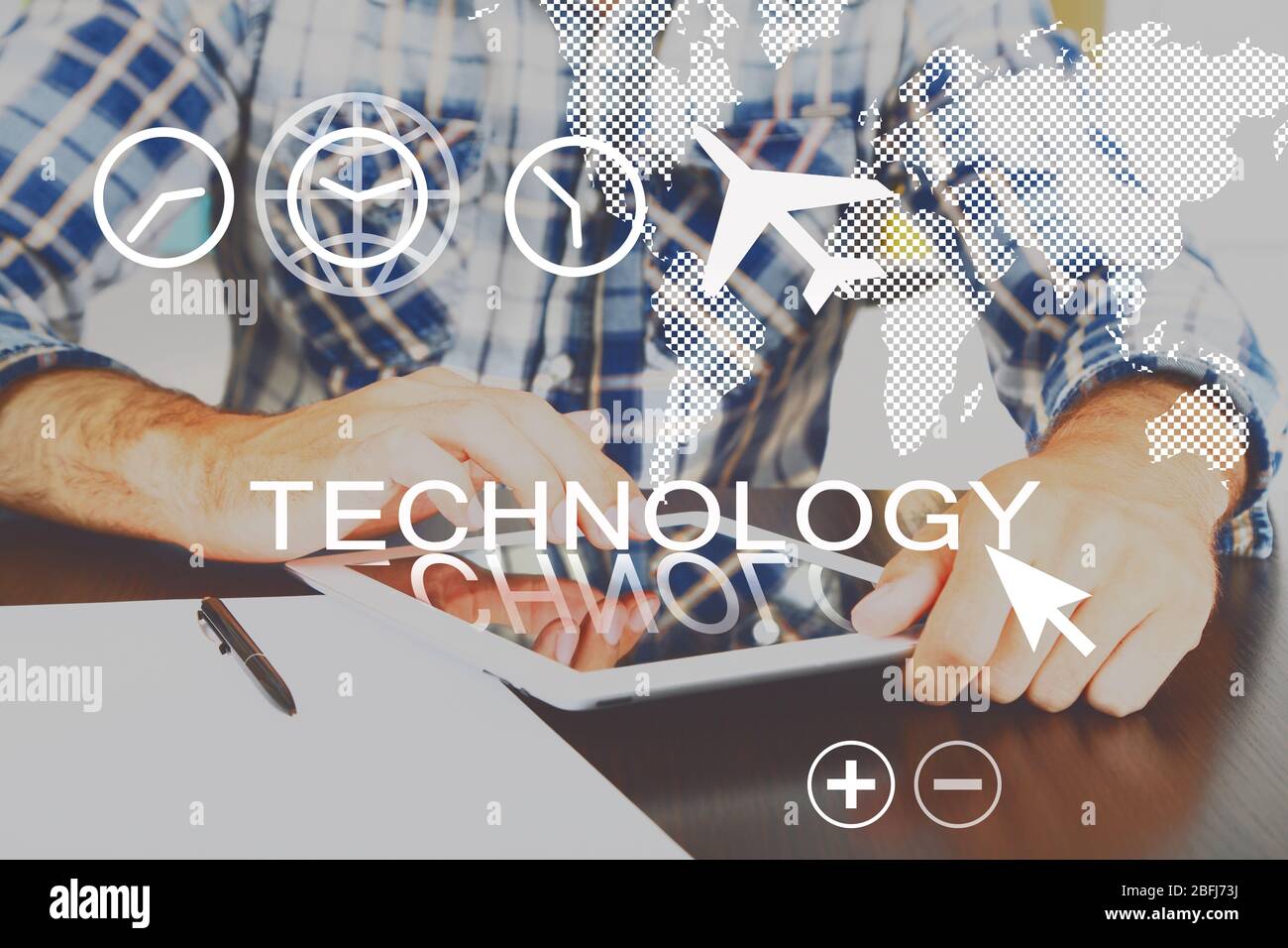 Young man using tablet pc with digital layer effect on background Stock Photo