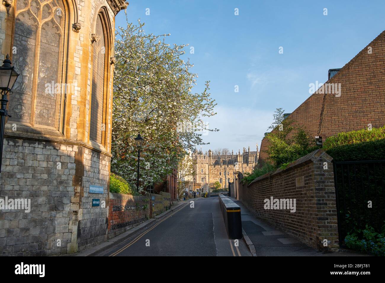 Windsor, Berkshire, UK. 12th April 2020. St Albans Street in Windsor next to Windsor Castle is deserted this bank holiday weekend as people heed Government advice to stay at home following the Coronavirus Pandemic in the UK. Credit: Maureen McLean/Alamy Stock Photo