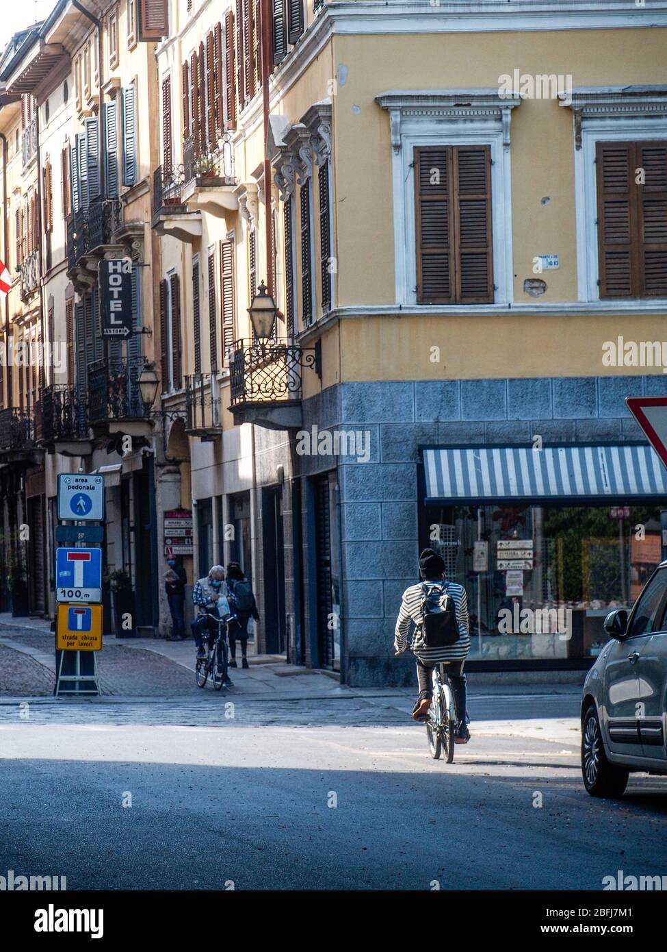 Cremona, Lombardy, Italy - April 19th 2020 - walking, dog walk, everyday life during covid-19 lockdown outbreak Stock Photo