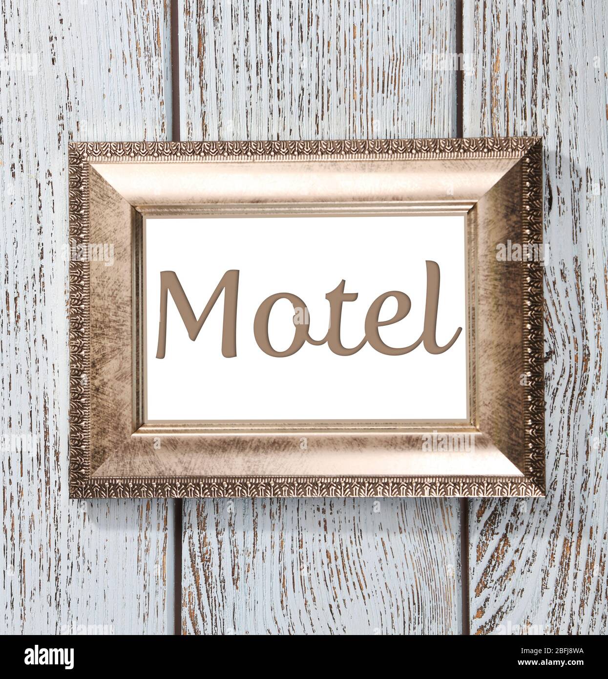 Word Motel in frame on wooden background Stock Photo
