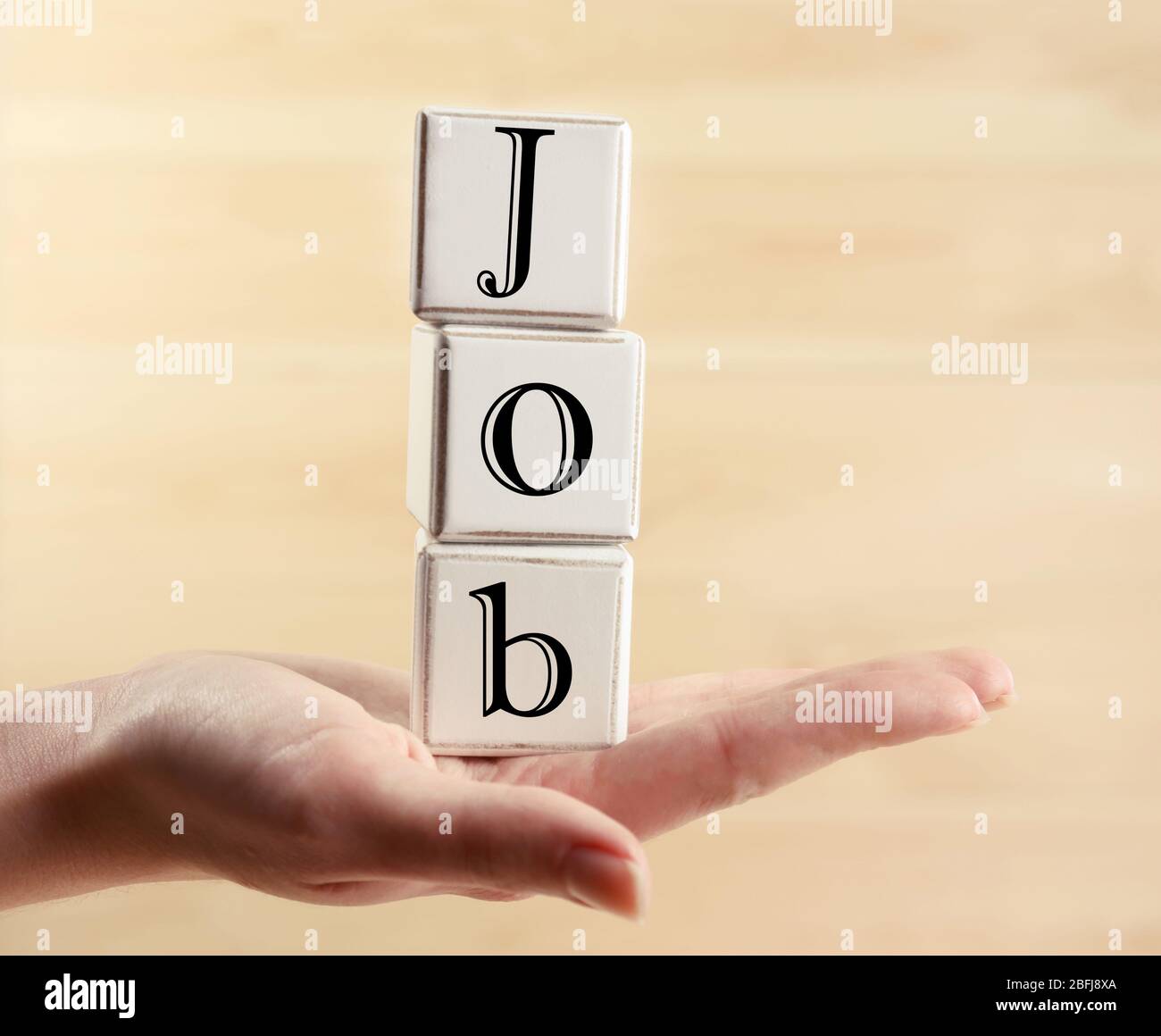 Job word spelled wooden hi-res stock photography and images - Alamy