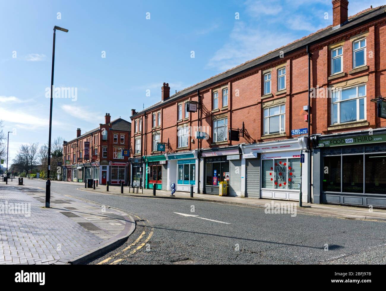 Shops on Third Avenue, the Village, Trafford Park, Manchester, UK Stock