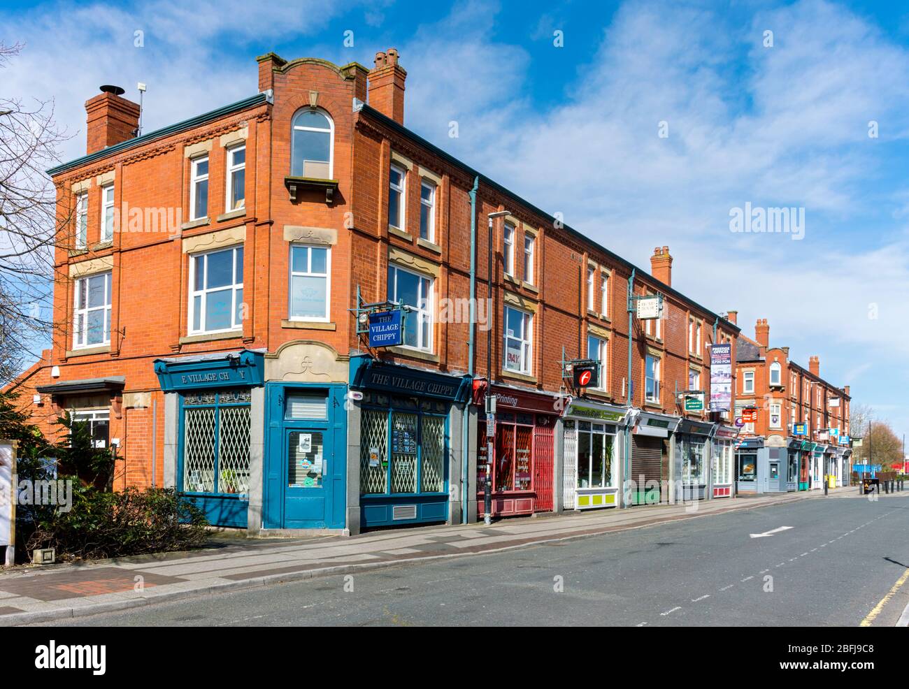Shops on Third Avenue, the Village, Trafford Park, Manchester, UK Stock