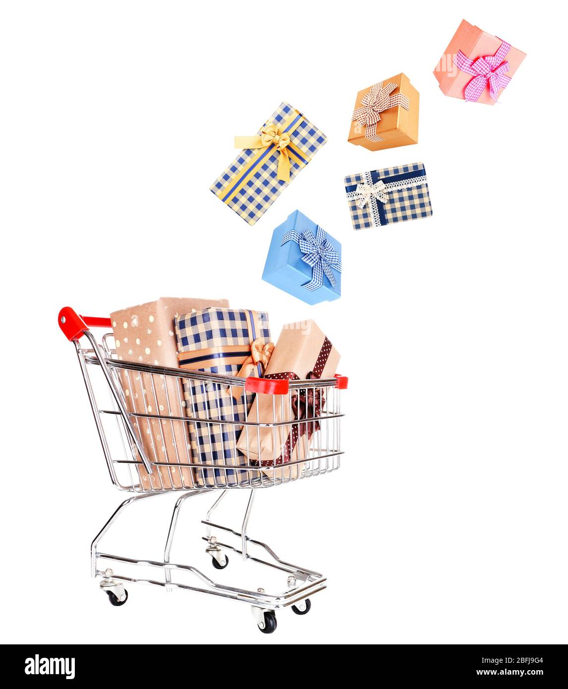 Gift boxes falling into cart isolated on white Stock Photo