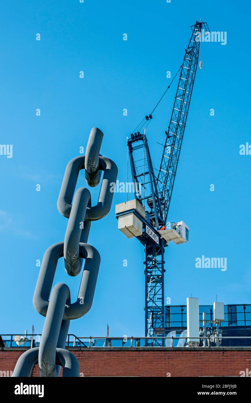 Skyhooks, a sculpture by Brian Fell, with a crane on the site of the No