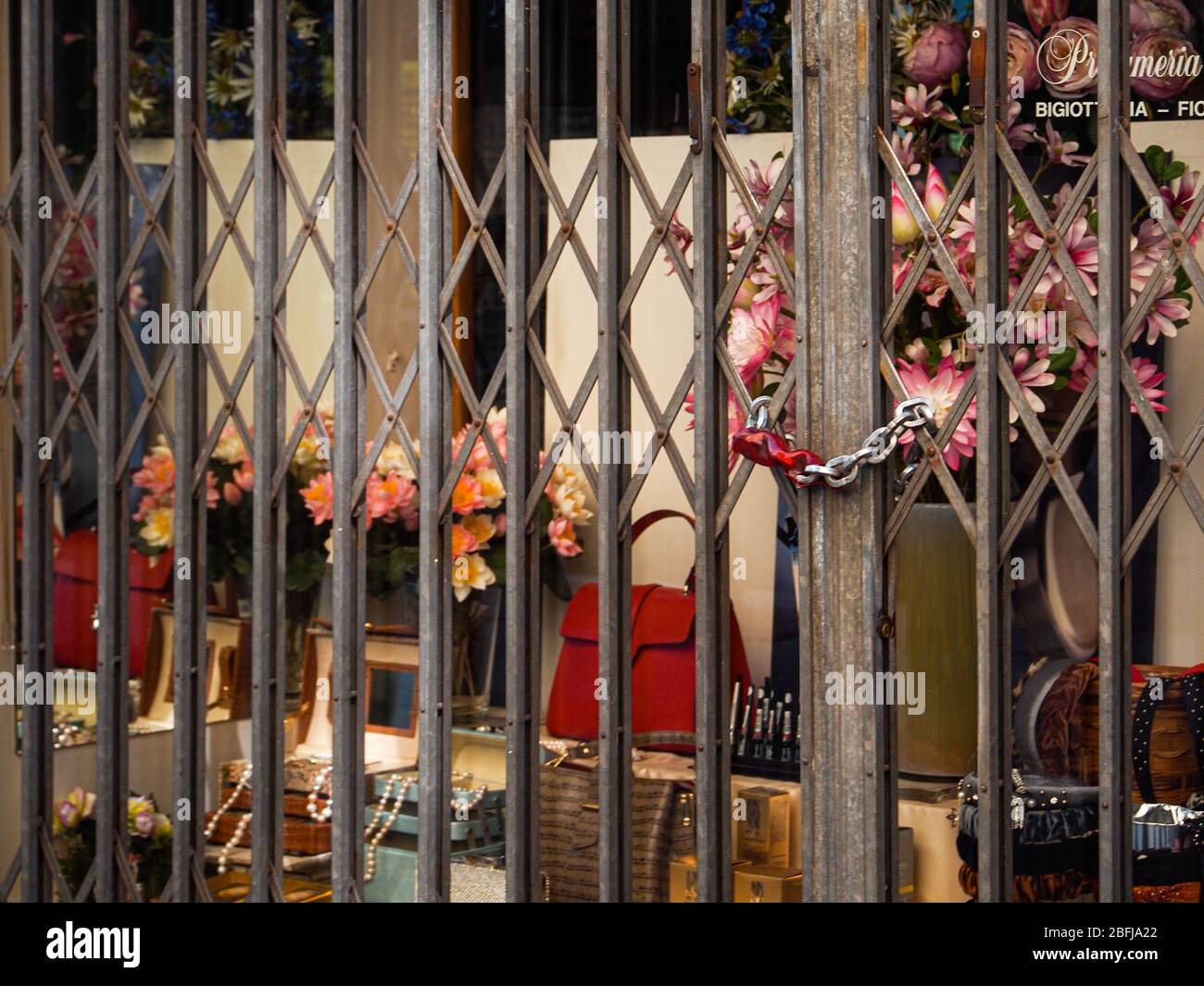 Cremona, Lombardy, Italy - April 19th 2020 - closed shos and stores , everyday life during covid-19 lockdown outbreak Stock Photo