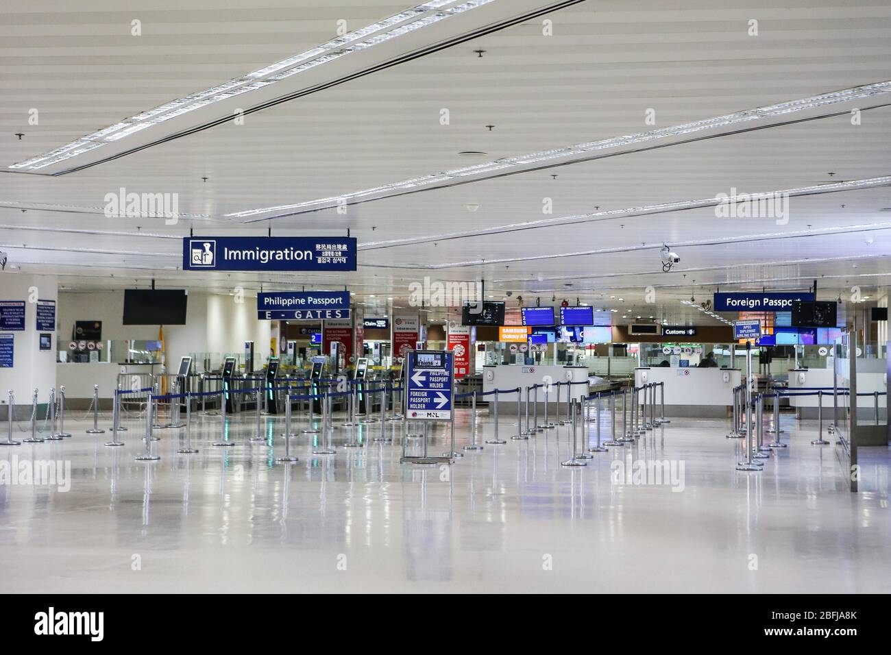 Paranaque City, Philippines. 19th Apr, 2020. The passenger arrival area of the Manila Ninoy Aquino International Airport (NAIA) terminal 1 remains empty as air traffic scale-down continues due to the COVID-19 pandemic in Paranaque City, the Philippines, on April 19, 2020. The Department of Health (DOH) of the Philippines reported on Sunday 172 new confirmed COVID-19 cases, bringing the total number in the country to 6,259. According to the DOH, 12 patients have died, bringing the death toll to 409. Credit: Rouelle Umali/Xinhua/Alamy Live News Stock Photo