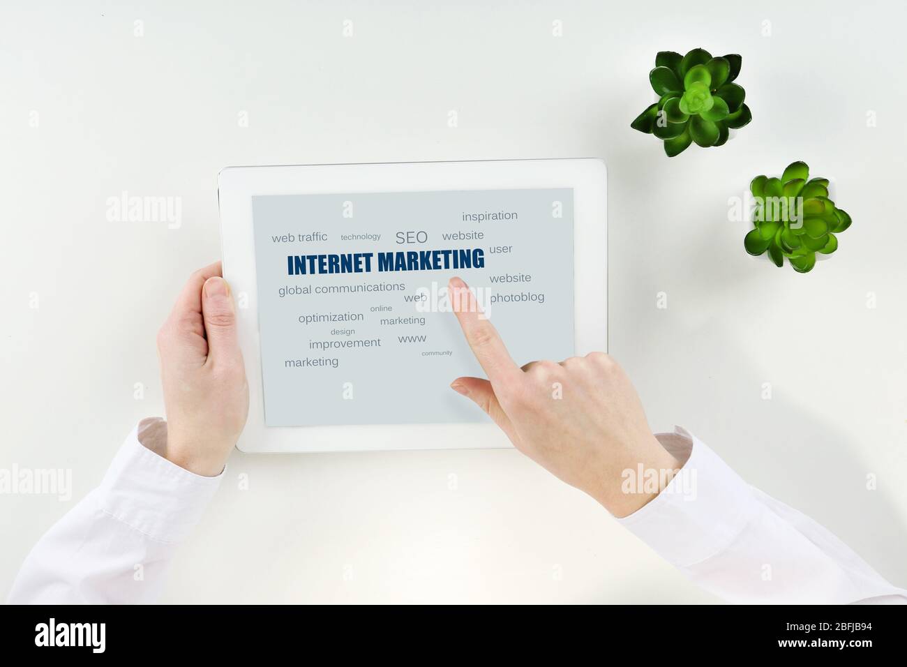 Word cloud in tablet. Internet marketing concept Stock Photo