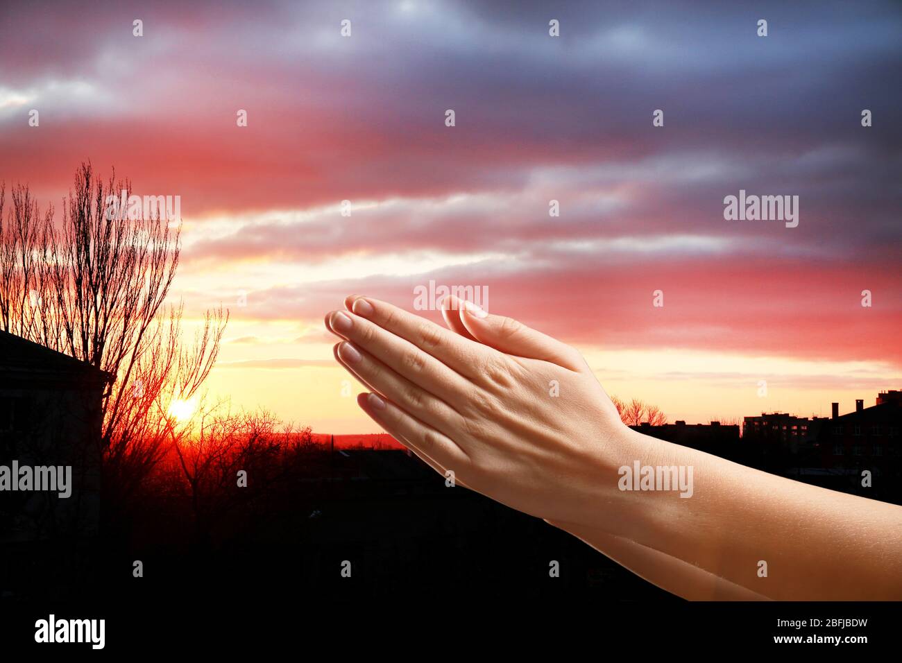 Human hands on sky background Stock Photo - Alamy