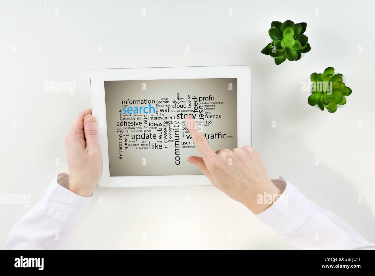 Word cloud in tablet. Search concept Stock Photo