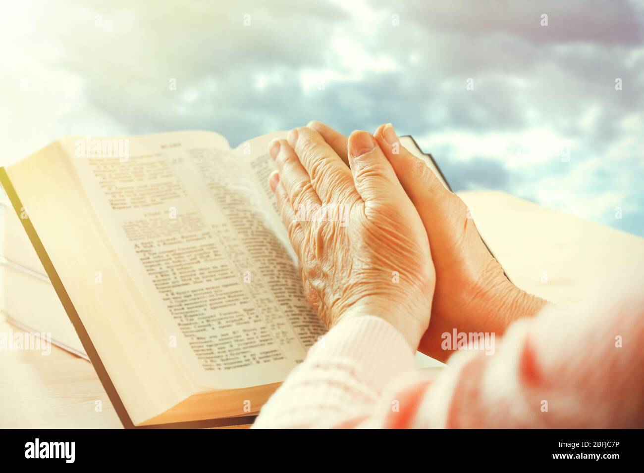Human hands on sky background Stock Photo - Alamy