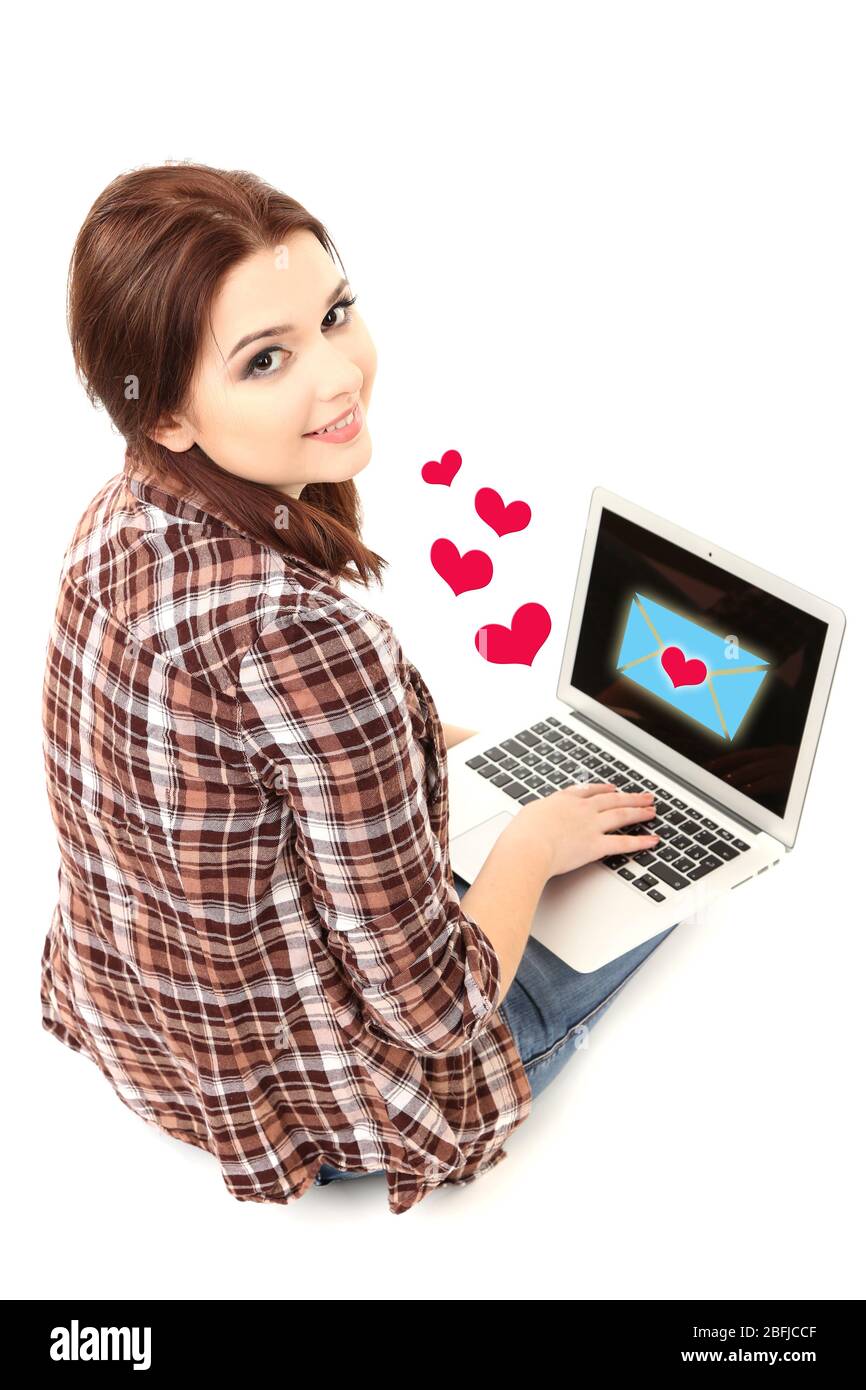 Beautiful young woman with laptop isolated on white Stock Photo - Alamy
