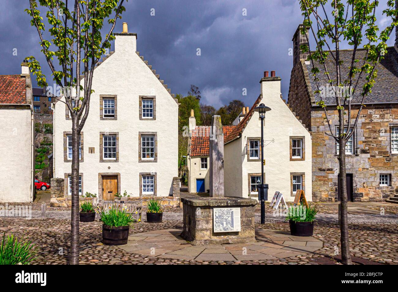 The remnants of The Tron (a weighbeam) at The town square and corner of Town House in the Royal Burgh of Culross Fife Scotland Stock Photo