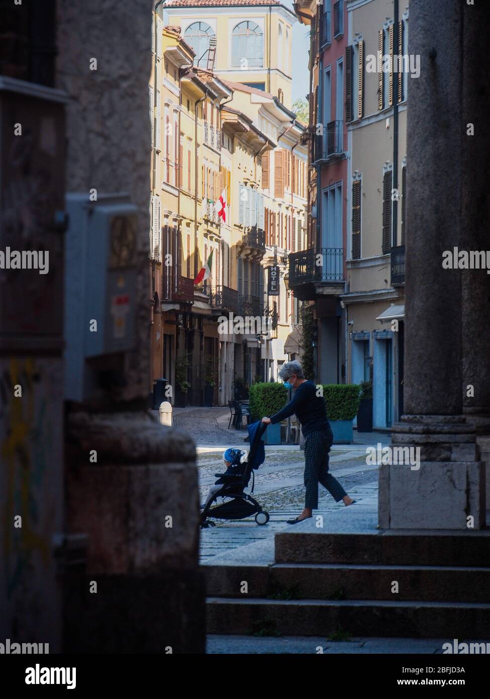 Cremona, Lombardy, Italy - April 19th 2020 - walking, dog walk, everyday life during covid-19 lockdown outbreak Stock Photo