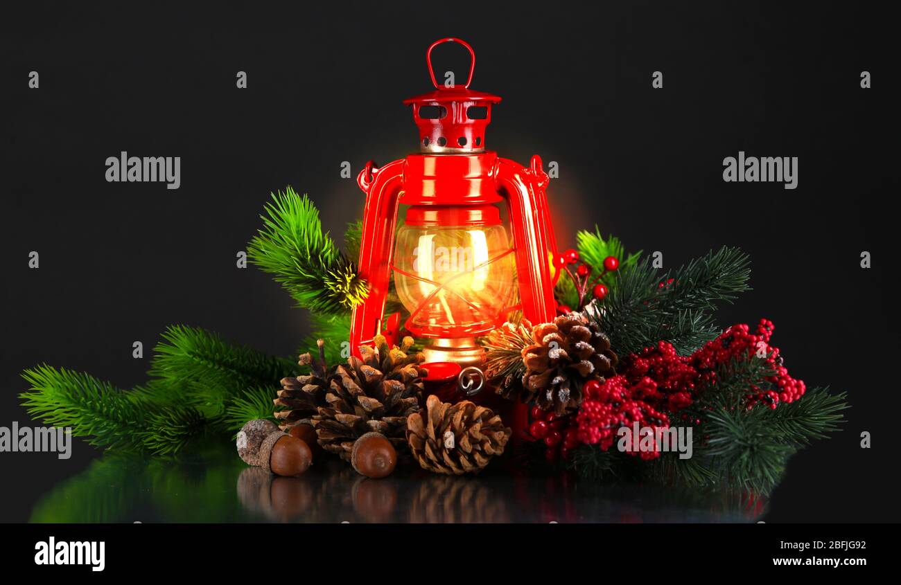Red kerosene lamp on black background Stock Photo - Alamy