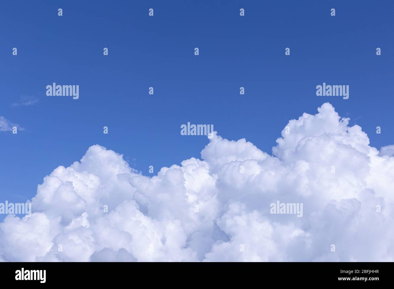 Blue sky background with white clouds on sunny day Stock Photo - Alamy