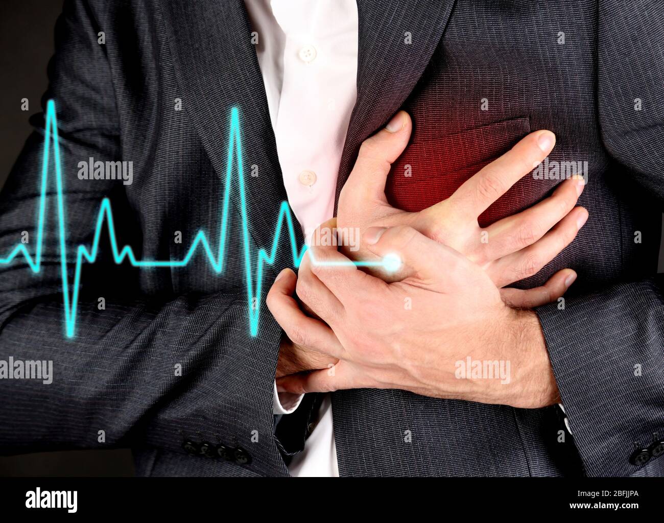Man having chest pain heart attack Stock Photo Alamy