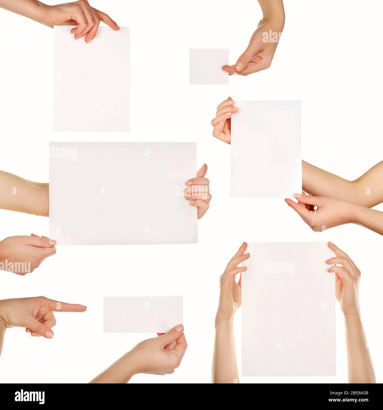 Hands holding blank cards isolated on white Stock Photo