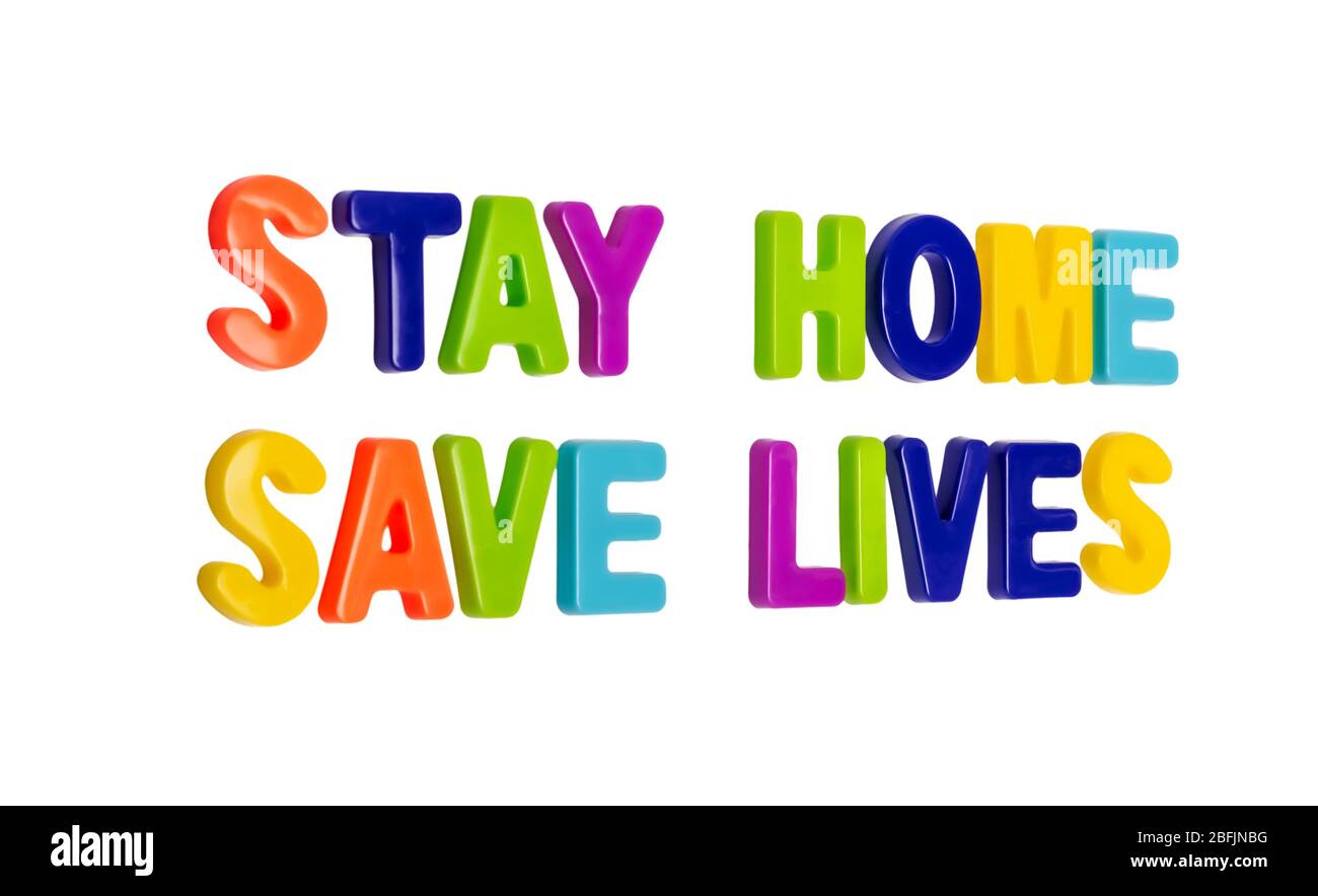 Coronavirus pandemic, text STAY HOME SAVE LIVES on a white background. A call for people to stay home during a global pandemic. COVID-19 is the offici Stock Photo