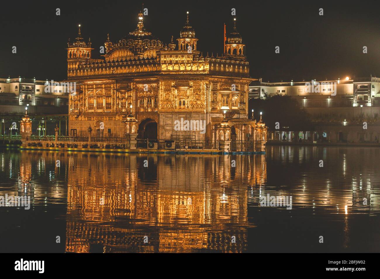 Golden Temple shining in Amritsar at night. Stock Photo