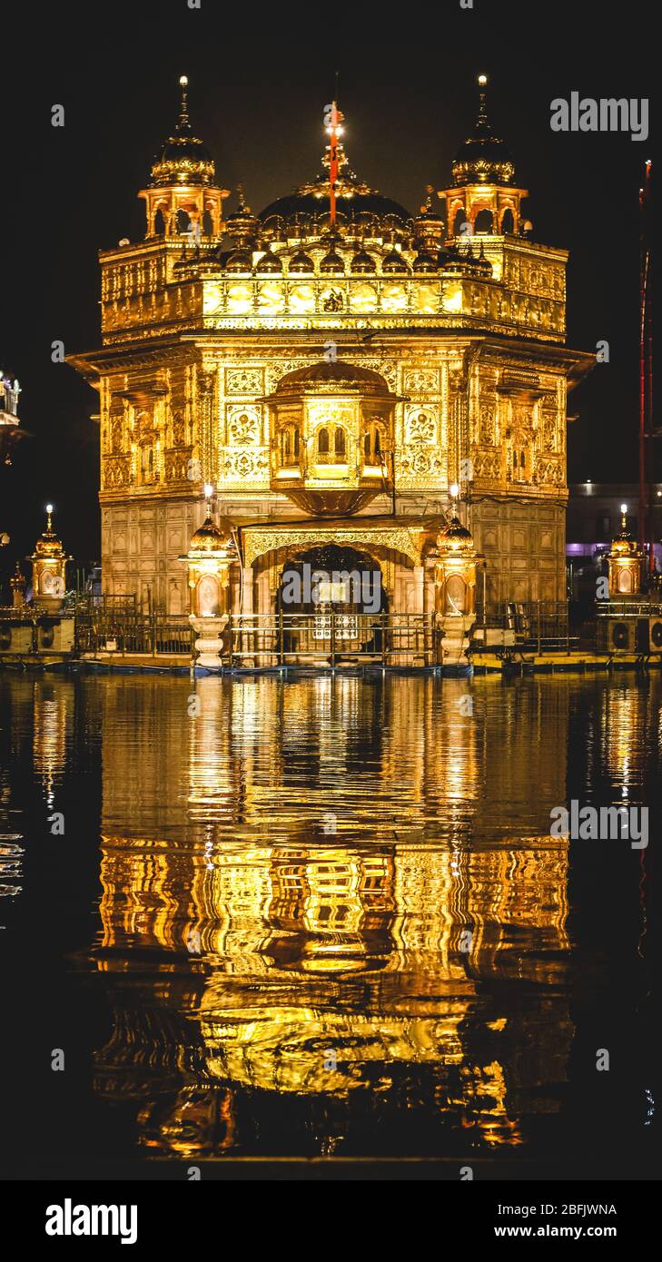 Golden Temple shining at night in Amritsar, Punjab. Stock Photo