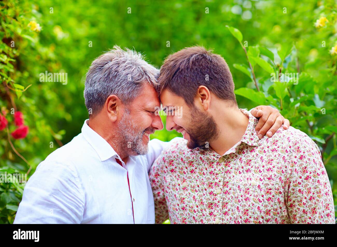Same Father portrait of happy father and son, that are similar in appearance Stock ...