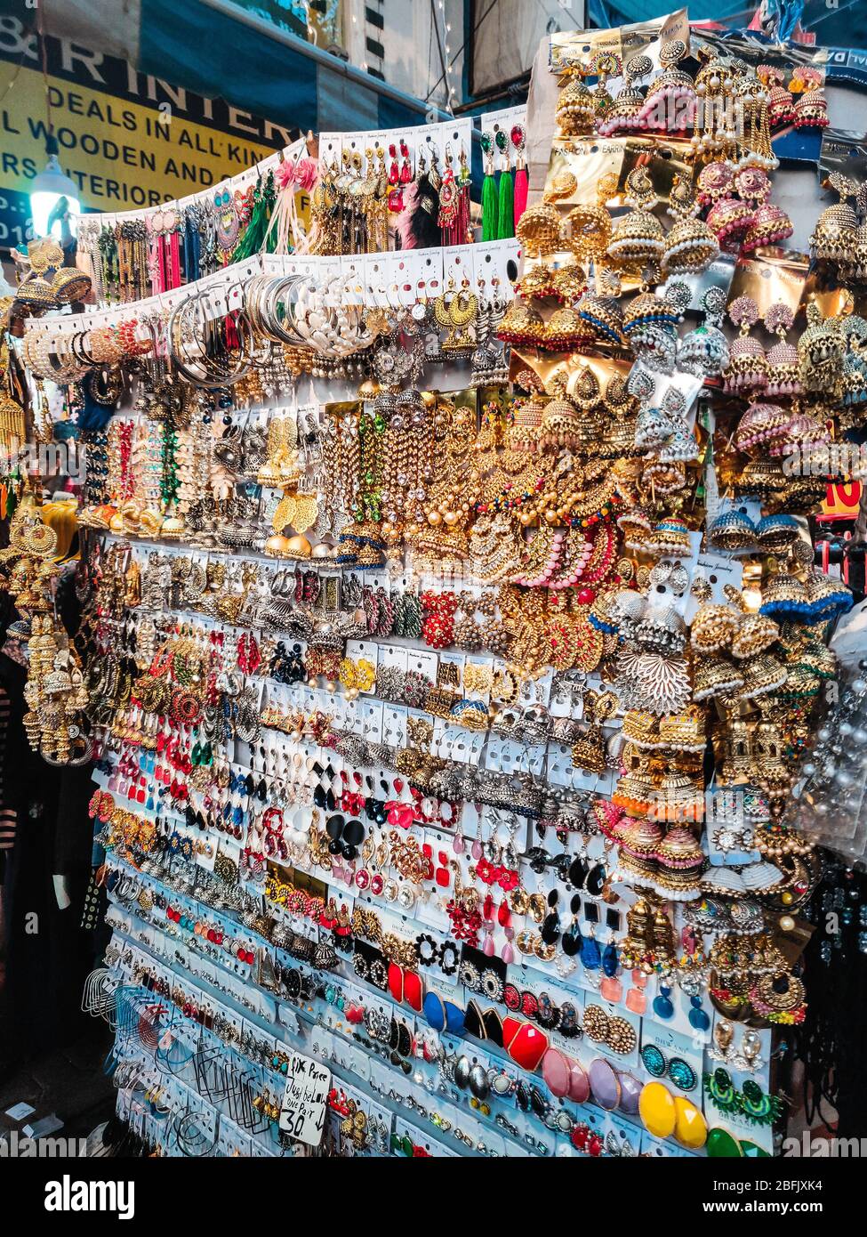 A shop selling earrings in Delhi's Sarojini Nagar market. Stock Photo