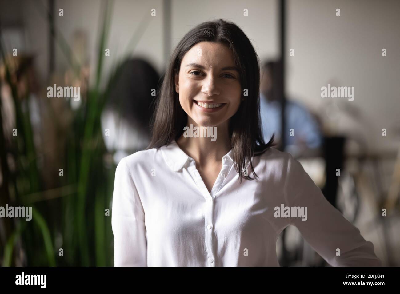 Headshot portrait of smiling Caucasian female employee posing Stock ...