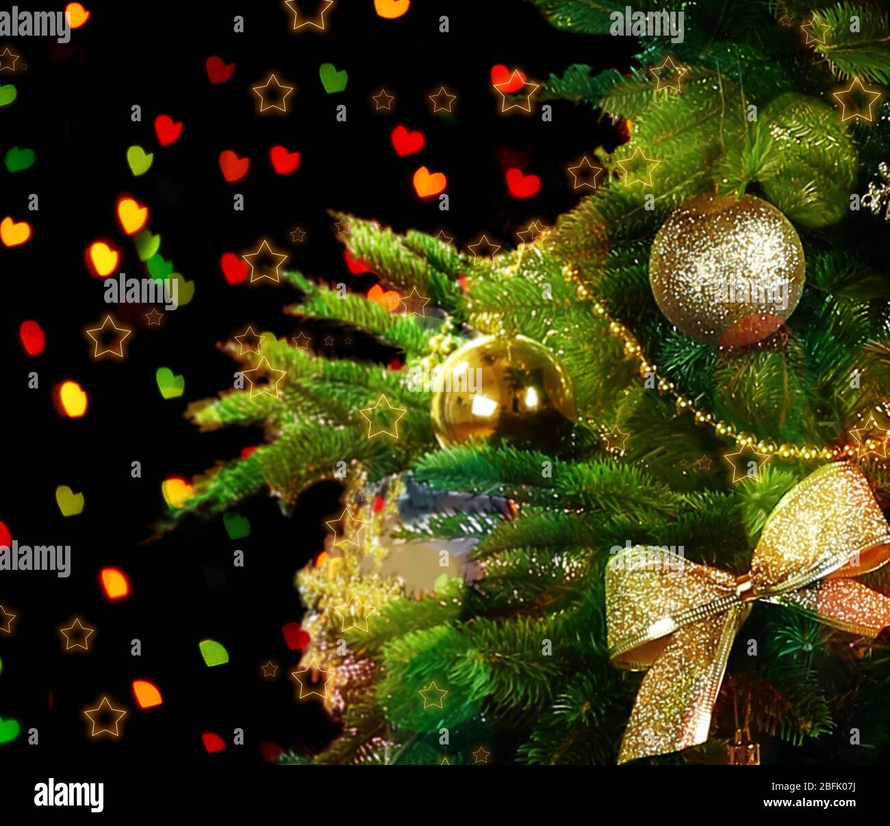 Decorated Christmas tree on festive shiny background Stock Photo Alamy