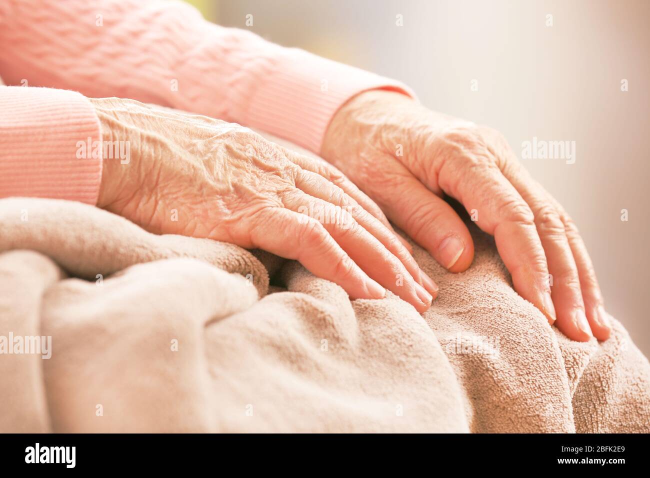 Elderly woman's hands, care for the elderly concept Stock Photo