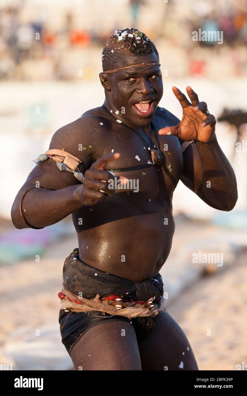 A wrestler warms up before a match in Dakar, Senegal. Stock Photo