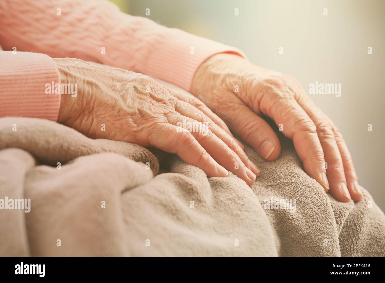 Elderly woman's hands, care for the elderly concept Stock Photo