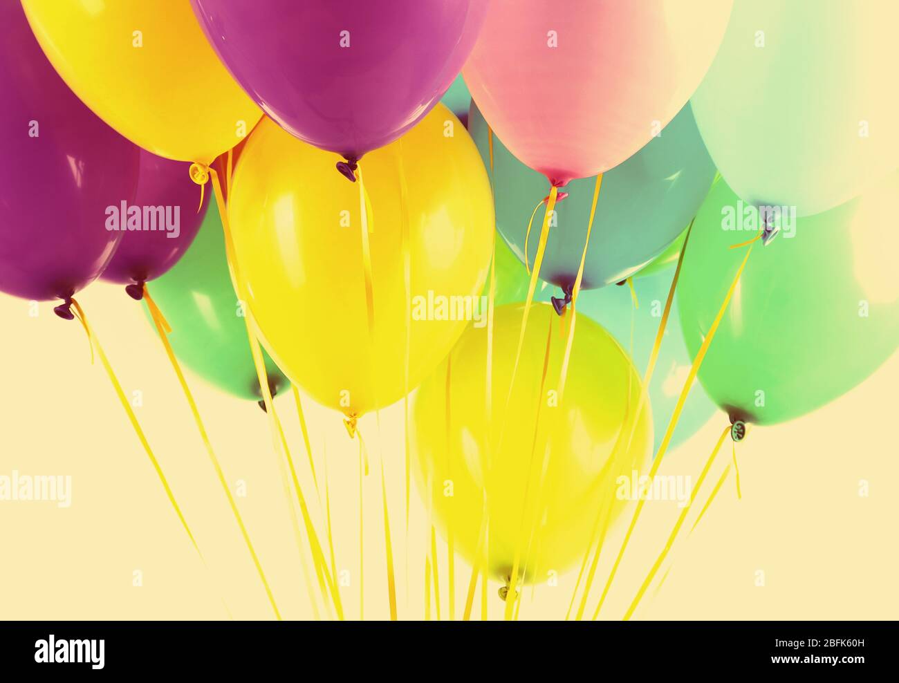 Colorful balloons isolated on white Stock Photo - Alamy