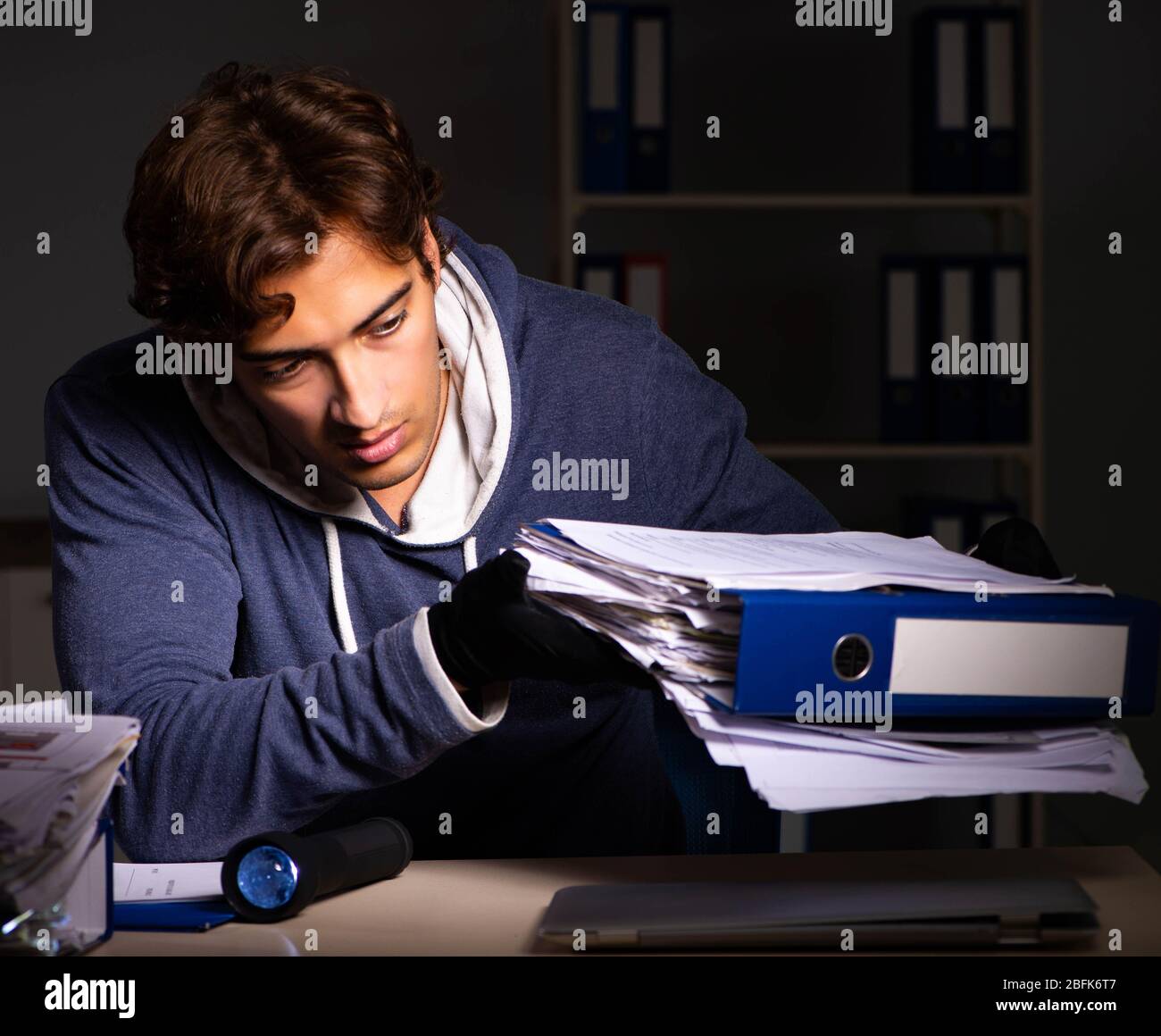 The thief trying to steal personal data in identity theft concept Stock Photo