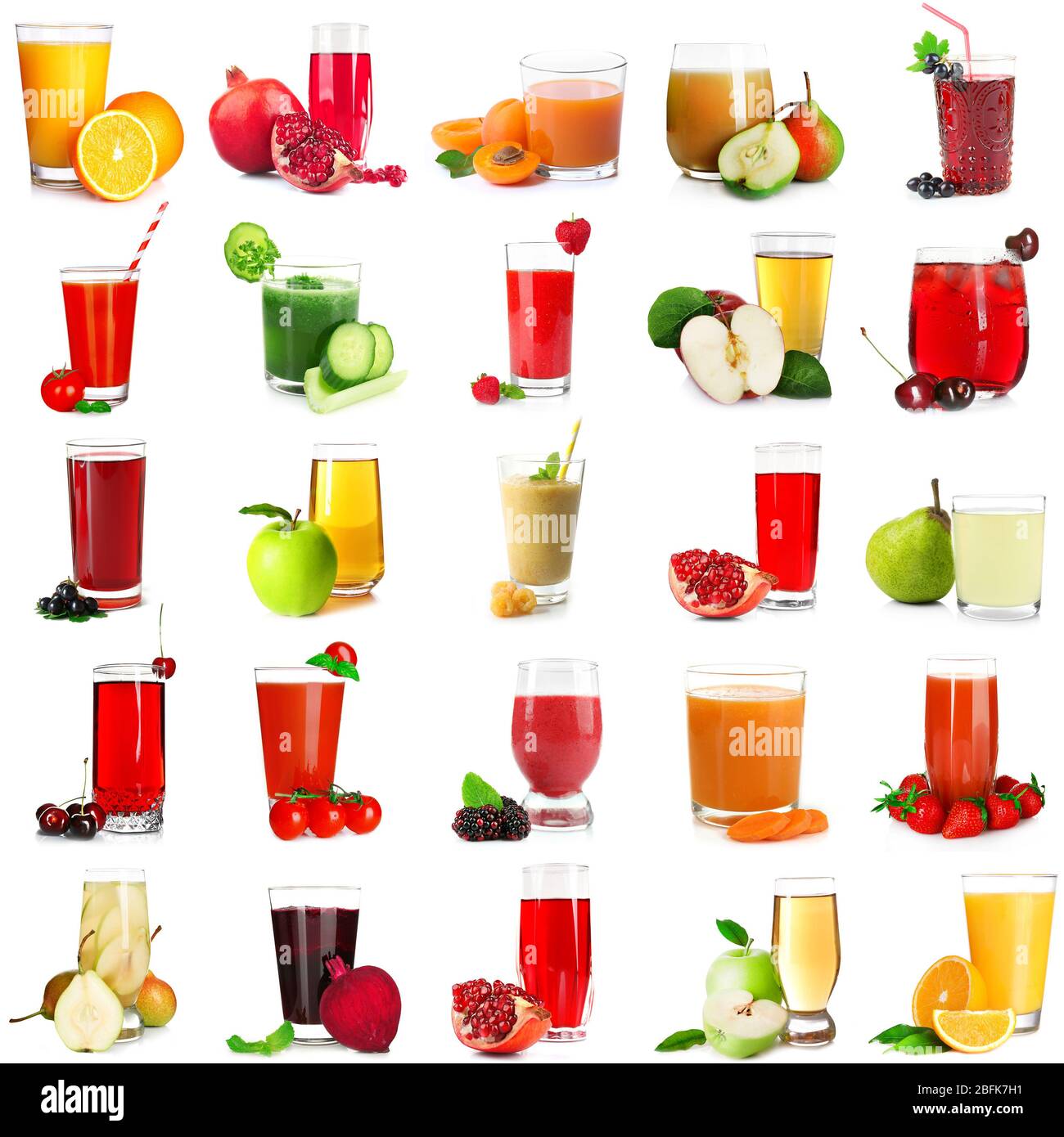 Isolated juices. Glasses of fresh juice and pile of tropical fruits  isolated on white background with clipping path Stock Photo - Alamy