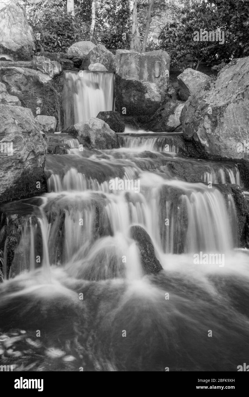Waterfall in Japanese Garden Kyoto Garden, Holland Park, Holland Park Avenue, Kensington, London W11 4UA Stock Photo