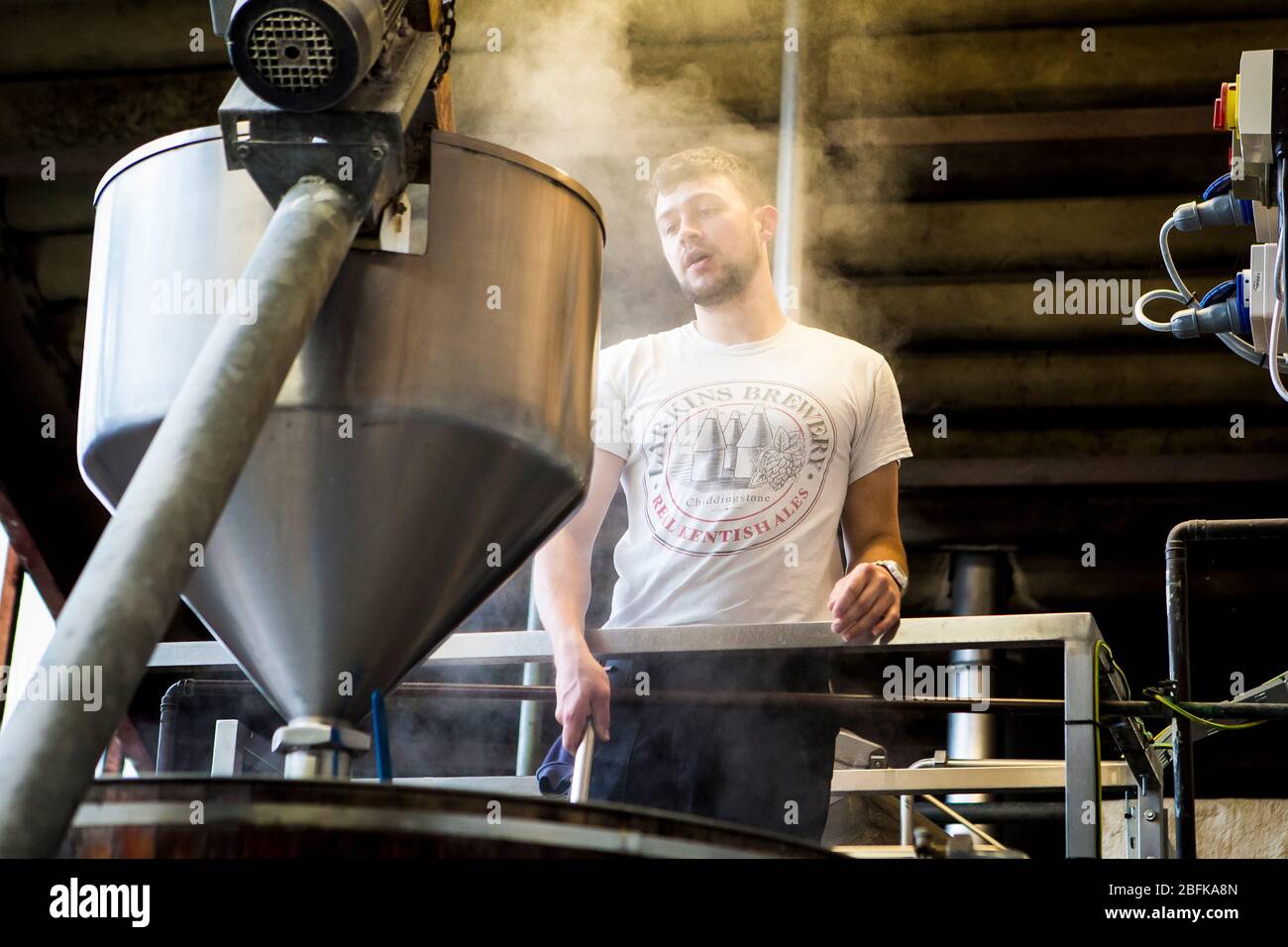 Master brewer Chris Taylor brewing beer at Larkins Brewery award winning brewery and hop farm in Chiddingstone, Kent, UK Stock Photo