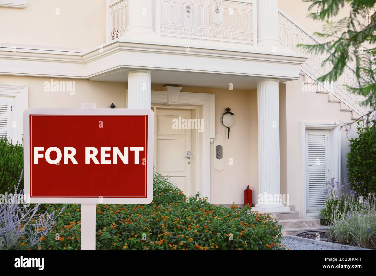 Real estate sign in front of new house for rent Stock Photo Alamy