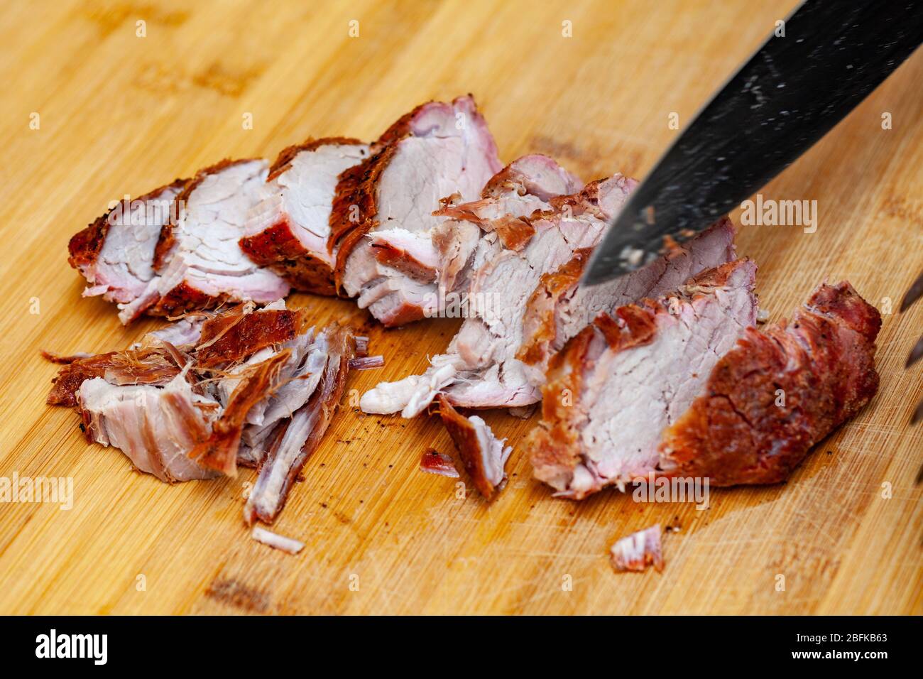 raw pork fresh fillet grilled. Knife cut meat Stock Photo