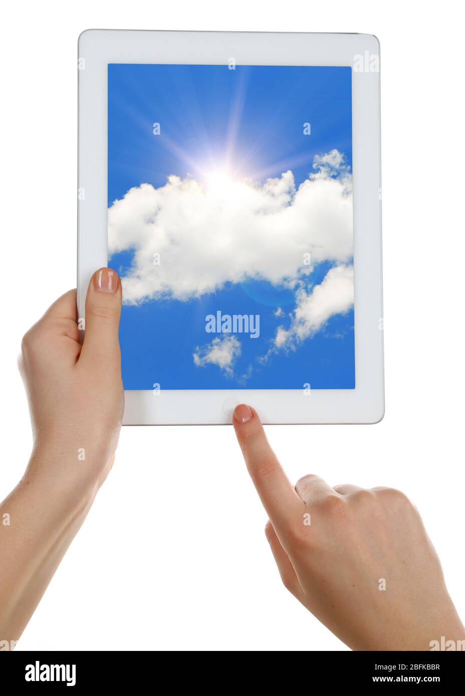 Hands holding tablet PC with sky in screen. Cloud computing concept Stock Photo